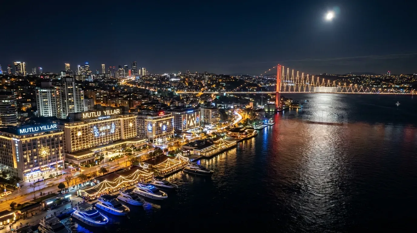 Bogaz kiyisindaki Mutlu Yillar tabelali rihtim isletme kompleksinin gece drone goruntusu